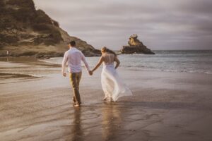 a romantic couple walking on the beach movie